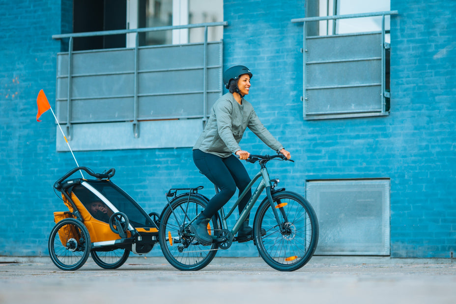 Fietsstoeltje of fietstrailer: wat past het best bij jullie gezin?