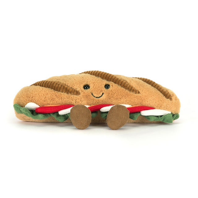 Jellycat Amuseable Caprese Baguette, zijaanzicht van het belegde broodje met beentjes
