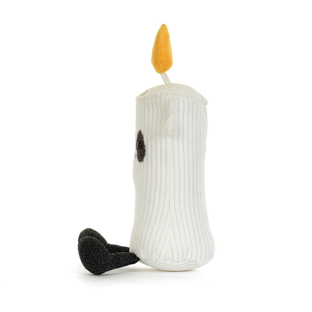 Jellycat Amuseables Flickerty Candle, zijaanzicht met zwarte beentjes