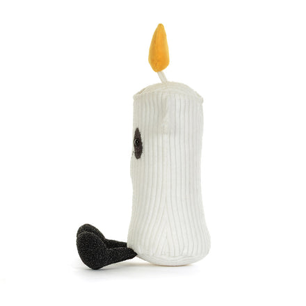 Jellycat Amuseables Flickerty Candle, zijaanzicht met zwarte beentjes