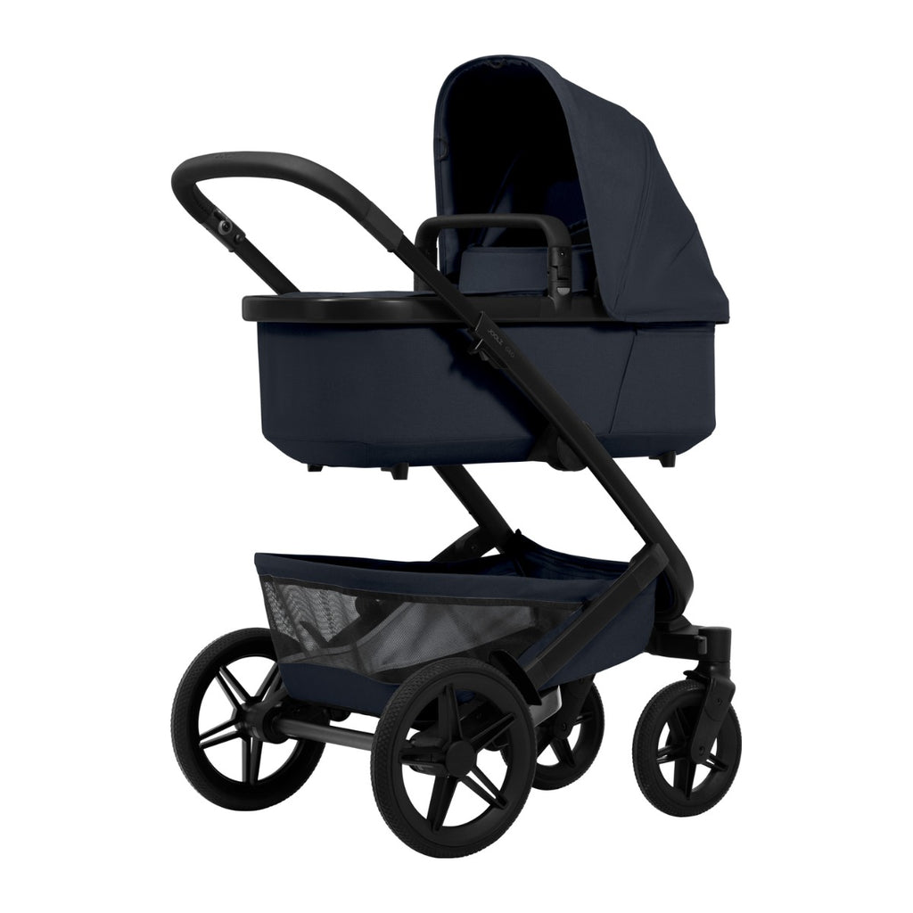 Joolz Kinderwagen Geo5 Complete Set Dark Navy Blue, zijaanzicht met de reiswieg