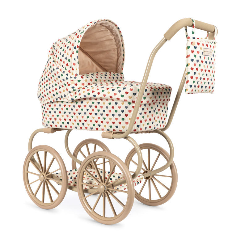Konges Sløjd Poppenwagen Minnie Doll Pram Coeur Coloré, poppenwagen op witte achtergrond