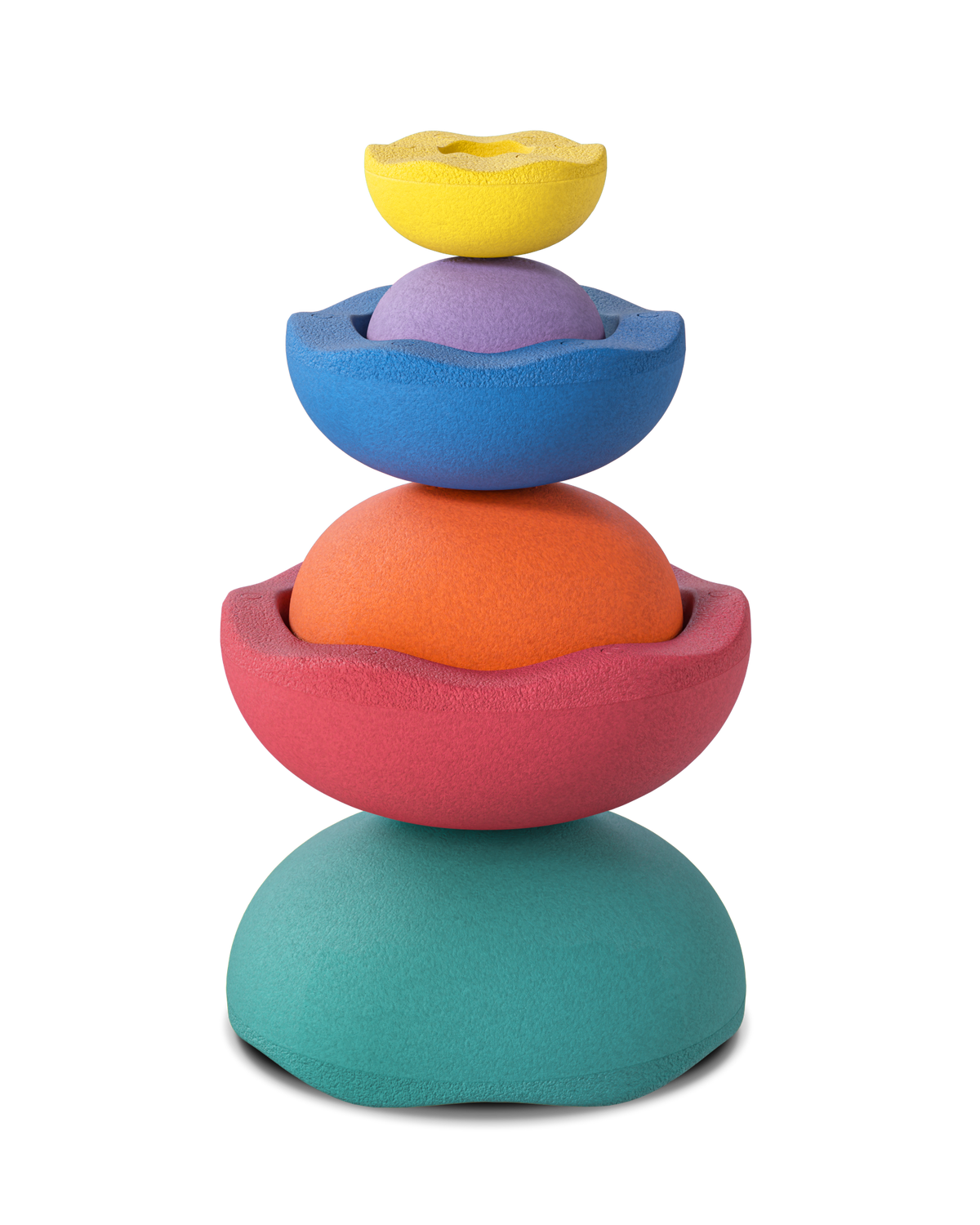 Stapelstein Inside Classic Rainbow, gestapelde sculptuur op een bureau in de kinderkamer