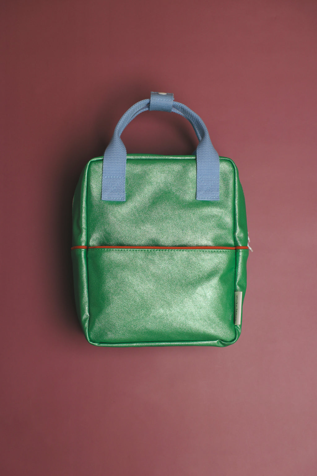 Sticky Lemon Rugzak Small Sticky Memories Glitter Green, rugzak tegen een donkere achtergrond