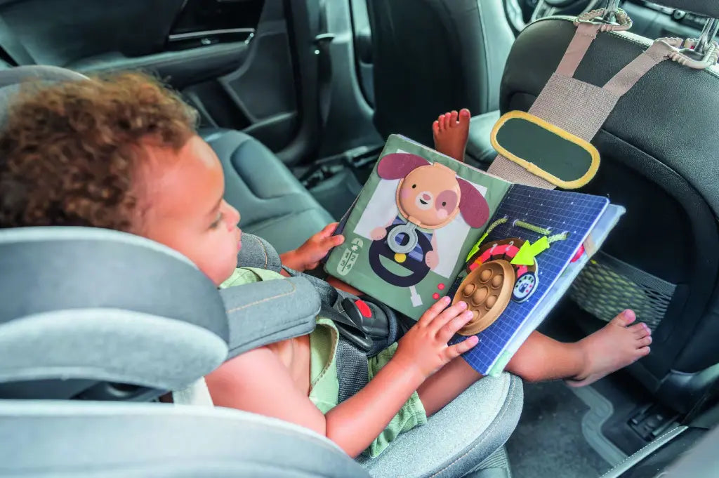 Taf Toys Ride Time Busy Book met siliconen pop-it bubbels en flapjes, te koop bij De Gele Flamingo.