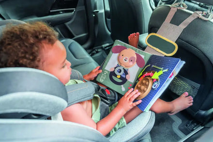 Taf Toys Ride Time Busy Book met siliconen pop-it bubbels en flapjes, te koop bij De Gele Flamingo.