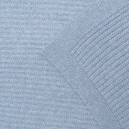 Frost Blue Hvid Kiki deken, in België gebreid van mulesing-free merinowol, bij De Gele Flamingo