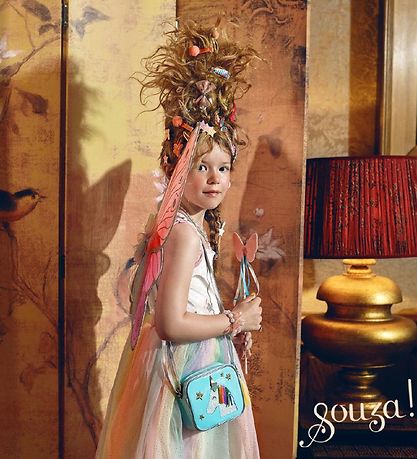 Detail van de Souza Carlina verkleedset met rok en vleugels